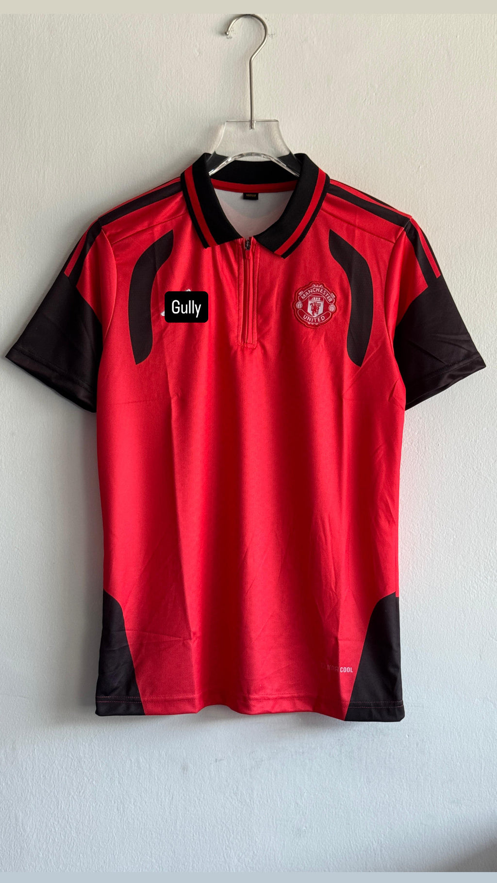 UNITED TRIO KIT 26/27 POLO ZIP EMBROIDERY