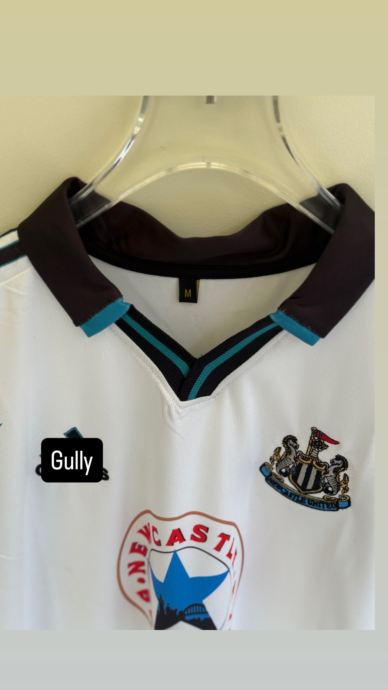 SHEARER NEW CASTLE UNITED POLO FIVE SLEEV EMBROIDERY