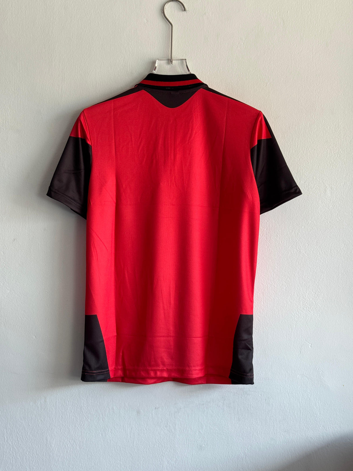 UNITED TRIO KIT 26/27 POLO ZIP EMBROIDERY
