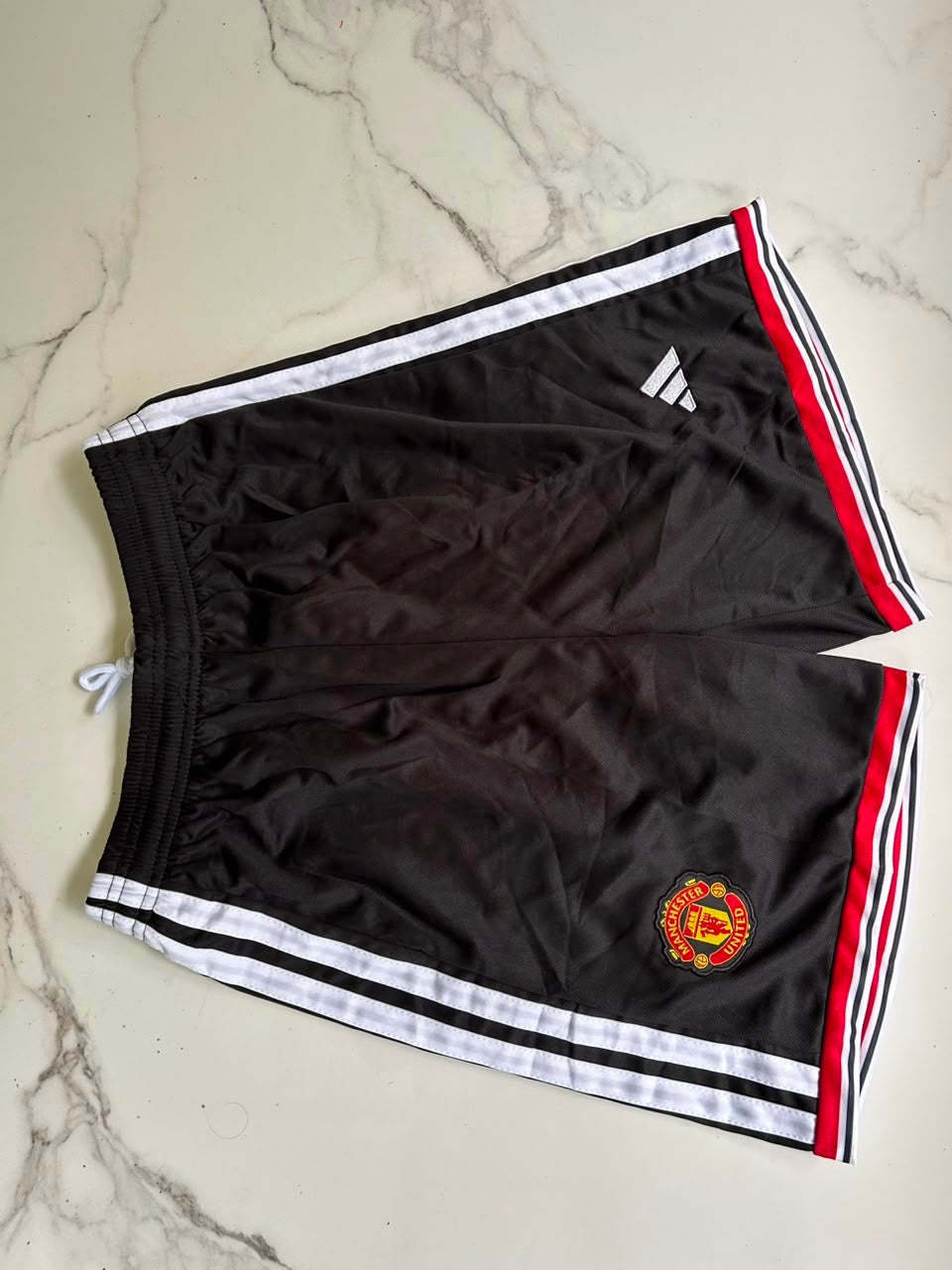 MANCHESTER UNITED 26/27 SHORTS EMBROIDERY